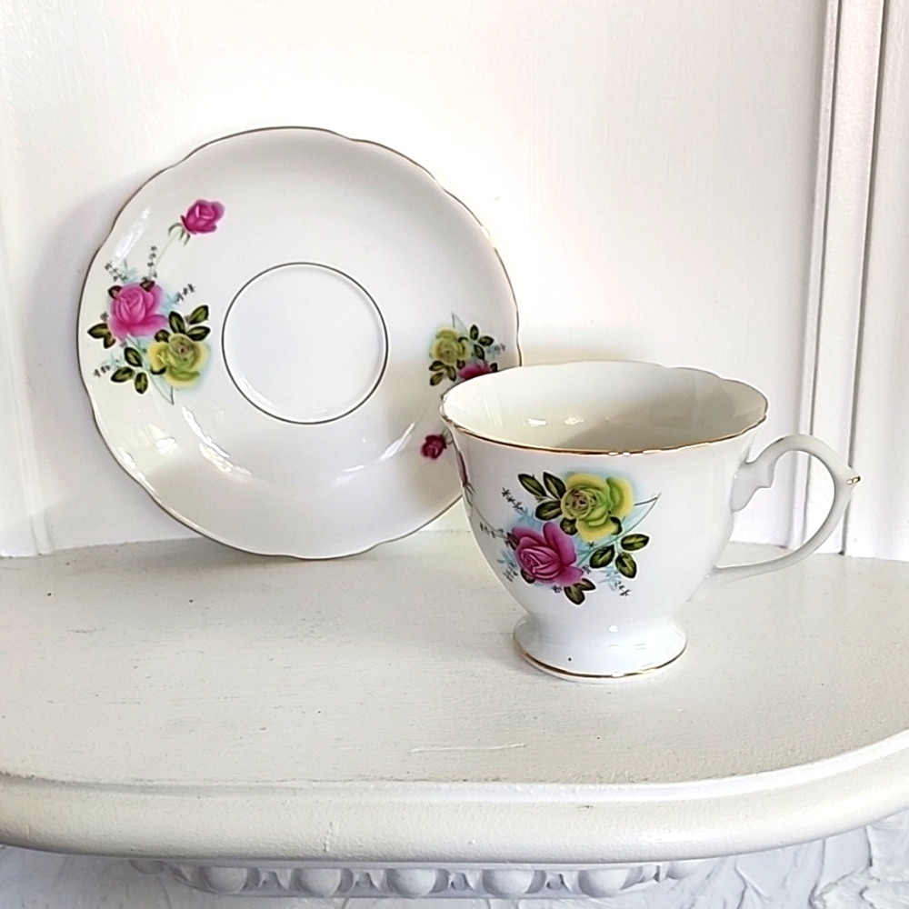 China Screw Pink And Yellow Rose Tea Cup And Saucer Set